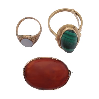 Lot 210 - Two hardstone set rings and a brooch