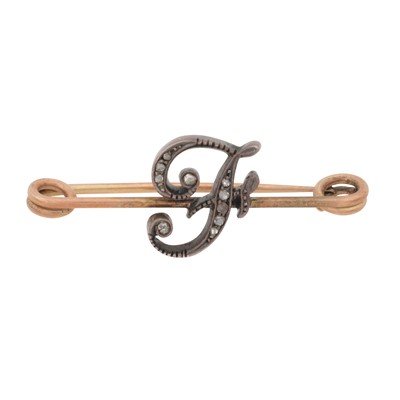 Lot 23 - A diamond letter F brooch