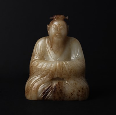 Lot 130 - A Chinese jade figure of a Daoist Immortal, Qing dynasty