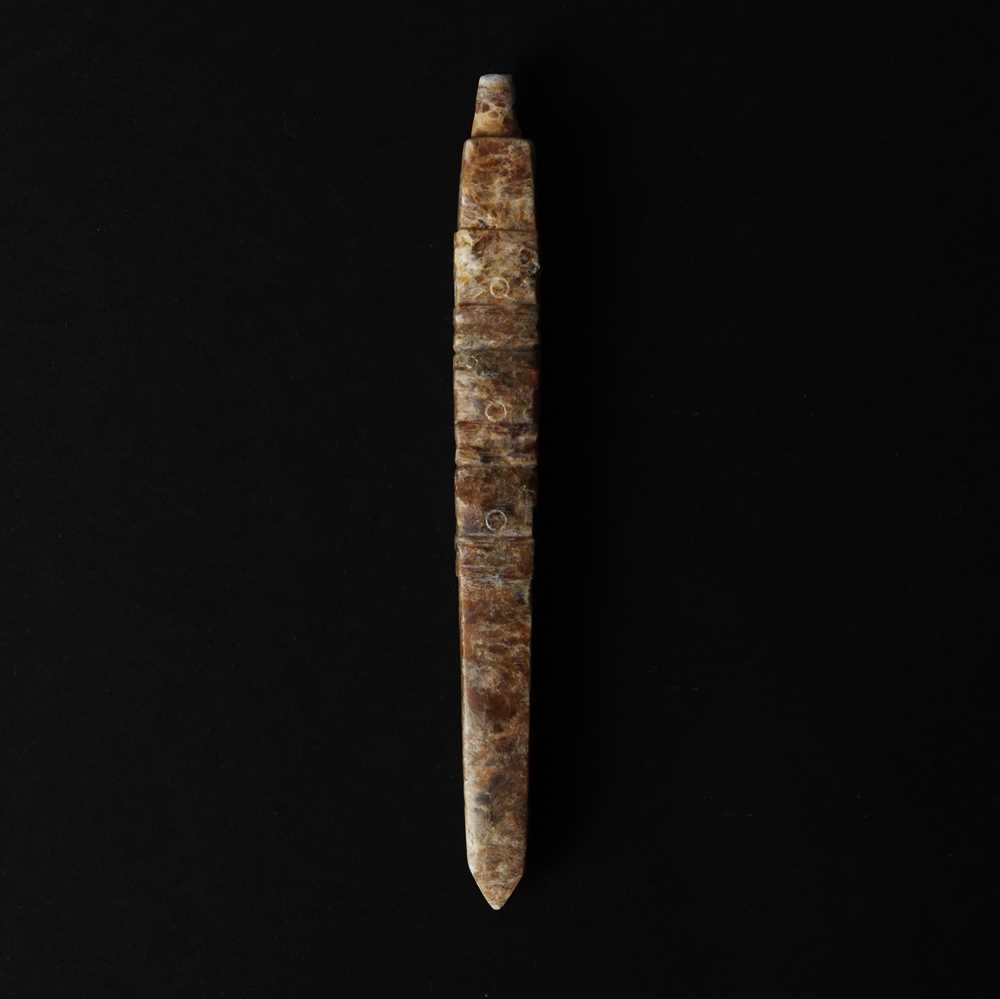 Lot 527 - A Chinese jade awl-shaped pendant amulet, Neolithic period or later