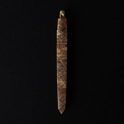 Lot 527 - A Chinese jade awl-shaped pendant amulet, Neolithic period or later