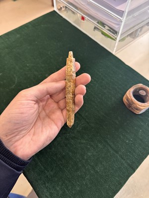 Lot 527 - A Chinese jade awl-shaped pendant amulet, Neolithic period or later