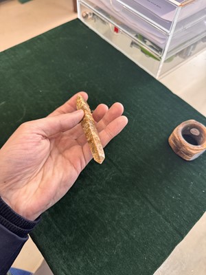 Lot 527 - A Chinese jade awl-shaped pendant amulet, Neolithic period or later