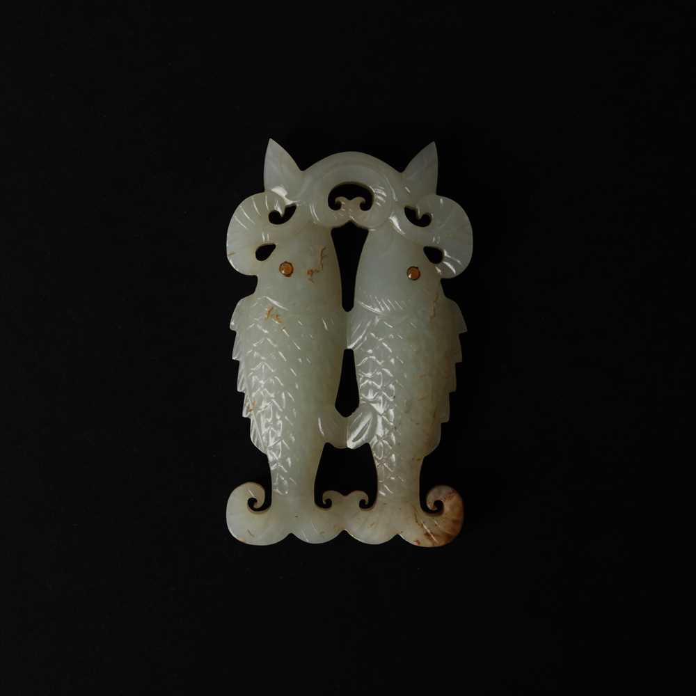 Lot 531 - A Chinese jade 'twin fish' pendant plaque, Qing dynasty