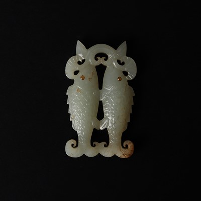 Lot 531 - A Chinese jade 'twin fish' pendant plaque, Qing dynasty