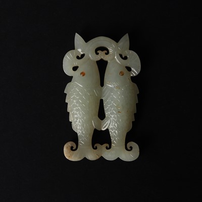 Lot 531 - A Chinese jade 'twin fish' pendant plaque, Qing dynasty