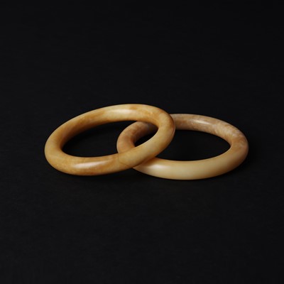 Lot 520 - Two Chinese jade bangles, 19th/20th century