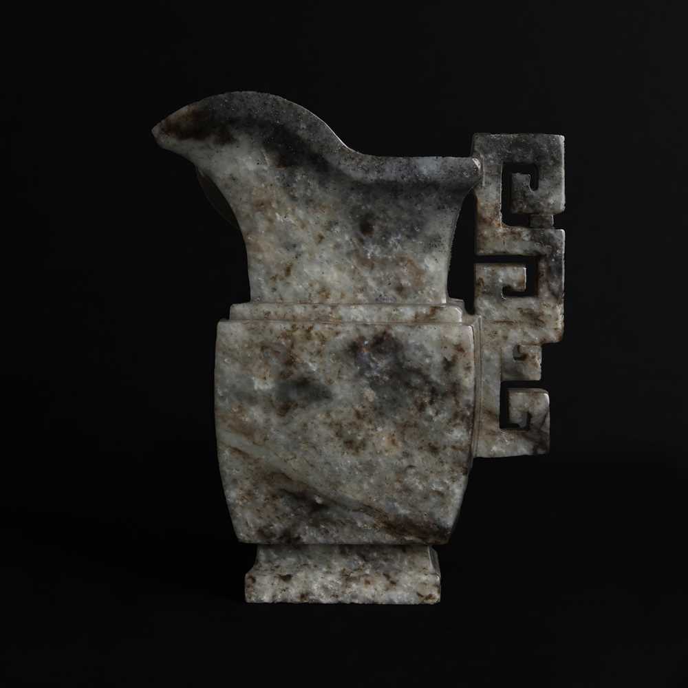 Lot 522 - A Chinese jade archaistic vase, 18th/19th century