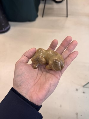 Lot 525 - A Chinese jade 'recumbent camel' figure, Song dynasty or later