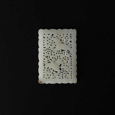 Lot 518 - A Chinese jade reticulated 'cranes' plaque, 20th century