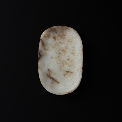 Lot 511 - A chicken chicken-bone jade 'floral' plaque, 19th century