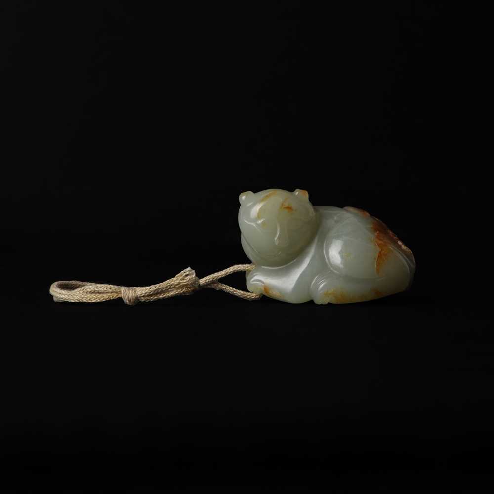 Lot 516 - A Chinese jade 'cat' group, 20th century