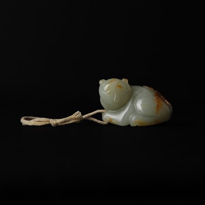 Lot 516 - A Chinese jade 'cat' group, 20th century