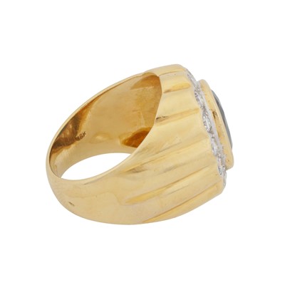 Lot 24 - A sapphire and diamond dress ring