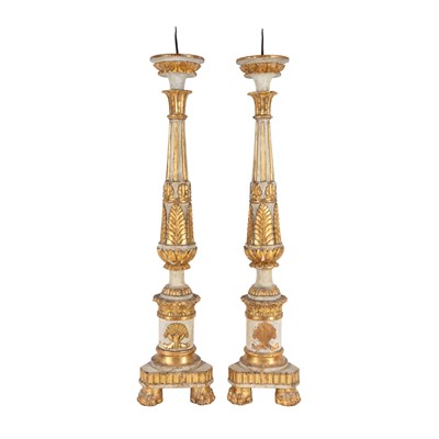 Lot 74 - A pair of Italian painted and parcel giltwood and gesso pricket candlesticks, 18th / 19th century
