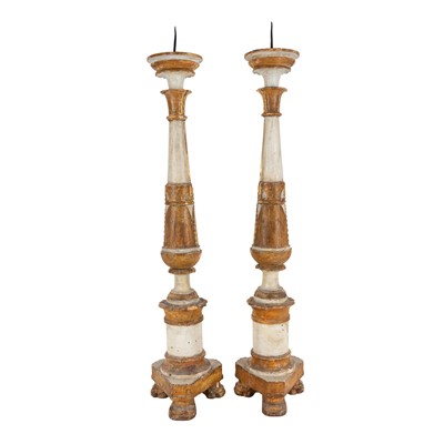 Lot 74 - A pair of Italian painted and parcel giltwood and gesso pricket candlesticks, 18th / 19th century