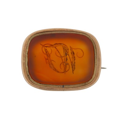 Lot 12 - A carnelian monogrammed brooch