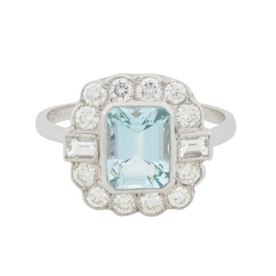 Lot 55 - An aquamarine and diamond halo ring