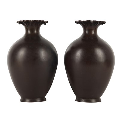 Lot 95 - A pair of Japanese bronze 'elephant' vases, Meiji period