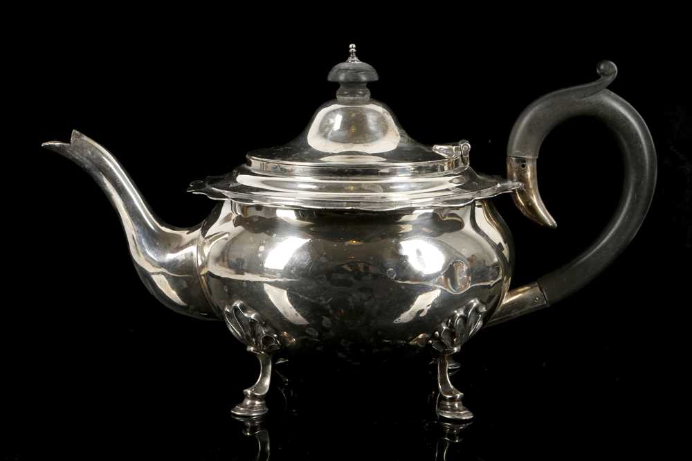 Lot 572 - A hallmarked silver teapot by the Goldsmith &...
