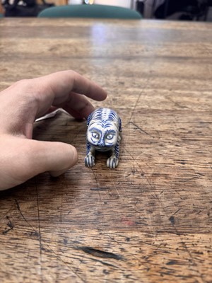 Lot 64 - A Japanese Hirado blue and white 'tiger' box and cover, kogo, Edo period