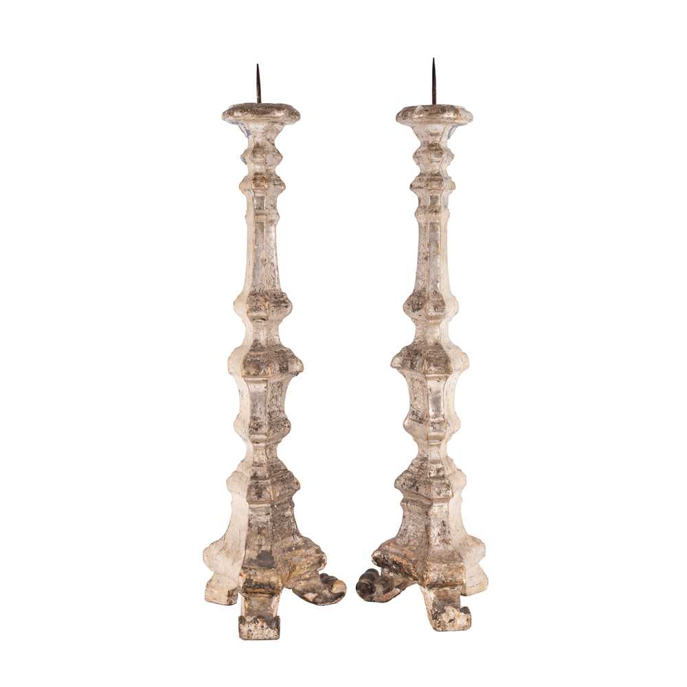 Lot 75 - A pair of Italian painted and silvered wood pricket candlesticks, 18th / 19th century
