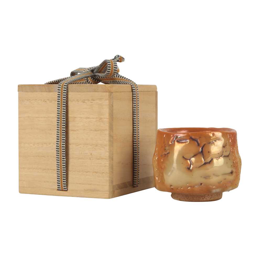 Lot 71 - A Japanese Shino ware sake cup (guinomi) by Tomio Suzuki (Japanese, b. 1948, Kyoto)