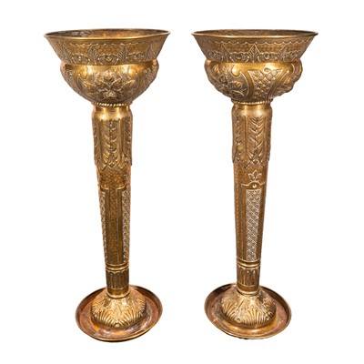 Lot 96 - A pair of brass jardiniere stands