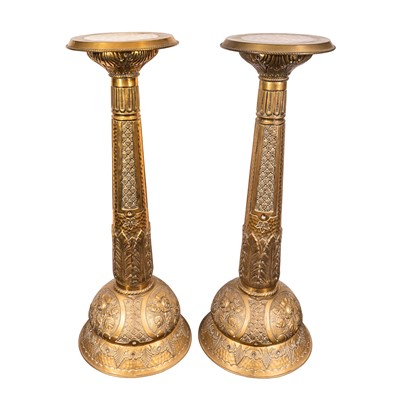 Lot 96 - A pair of brass jardiniere stands