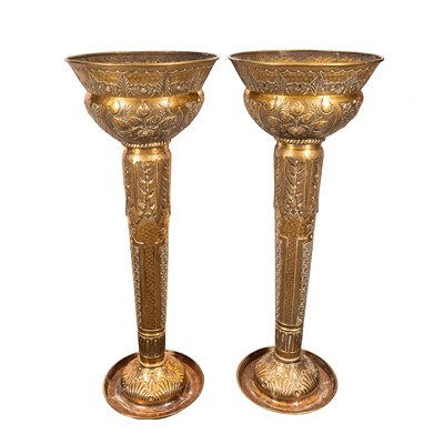 Lot 96 - A pair of brass jardiniere stands