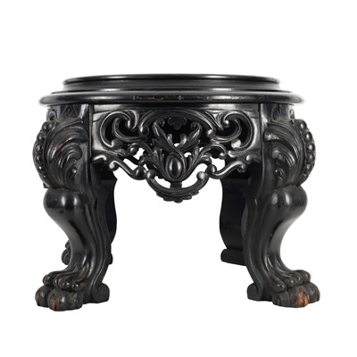 Lot 396 - A Chinese export style ebonised circular stand, early 20th century