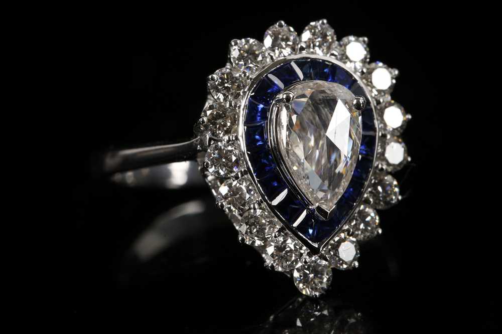 Lot 500 - An 18ct white gold, tear drop shape sapphire...