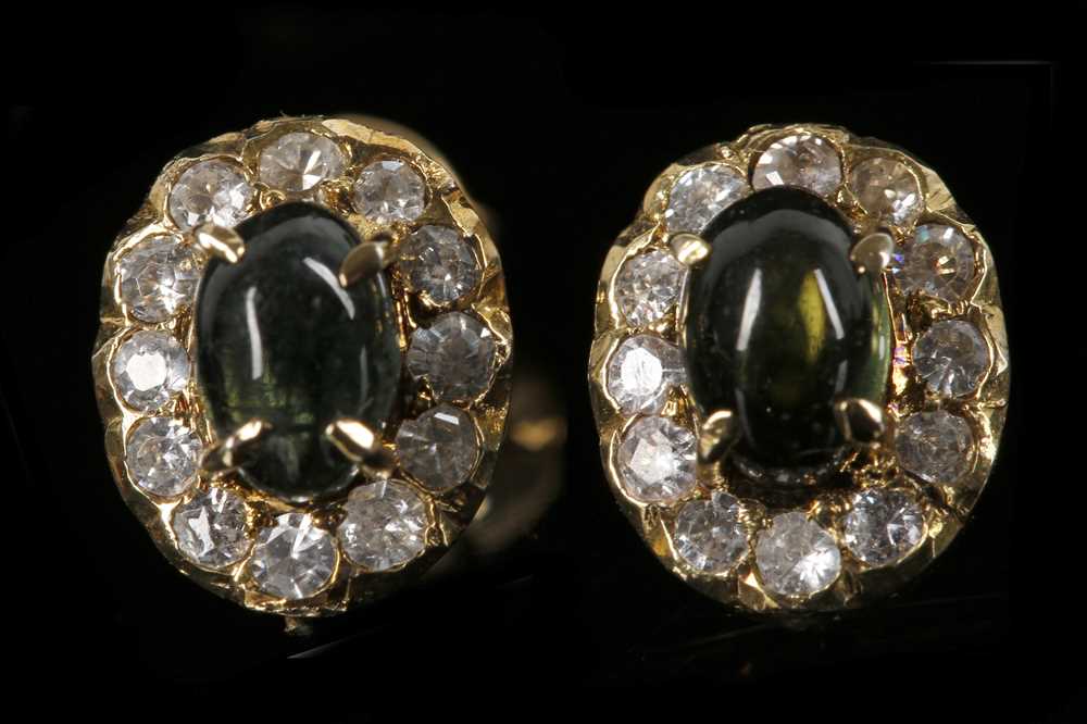 Lot 550 - A pair of high carat gold, cabouchon...