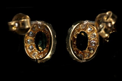 Lot 550 - A pair of high carat gold, cabouchon...