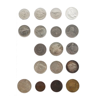 Lot 553 - A large folder of coins to include silver examples.