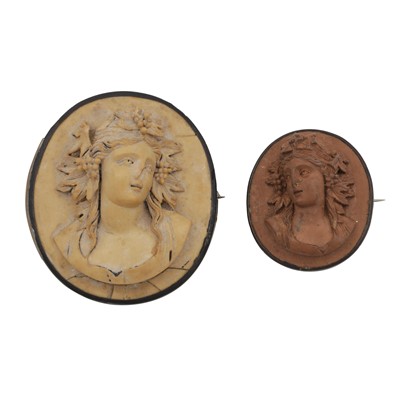 Lot 209 - Two lava cameo brooches
