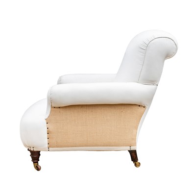 Lot 10 - A club armchair, attributed to Howard & Sons