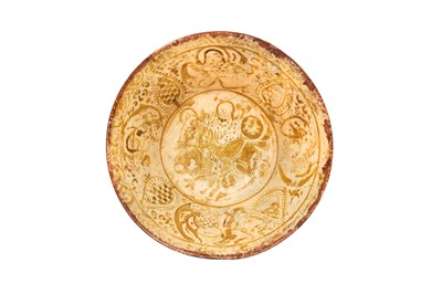 Lot 144 - A copper lustre-painted pottery bowl with a rider on horseback