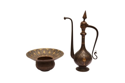 Lot 142 - A Qajar gold-damascened steel ewer and basin
