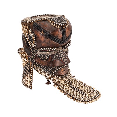 Lot 226 - A Kuba Bwoon Royal Mask or helmet, from the Kuba Kingdom, Congo