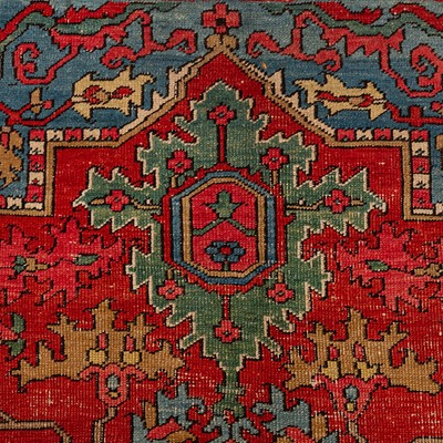Lot 90 - An antique Heriz carpet, north-west Persia