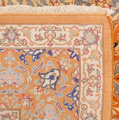 Lot 89 - An extremely fine and signed silk Qum rug, central Persia