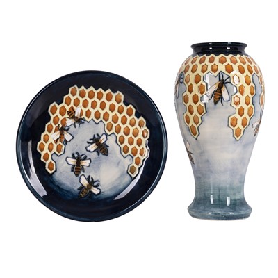 Lot 118 - A Moorcroft pottery ‘Honeycomb’ pattern vase and dish, late 20th century