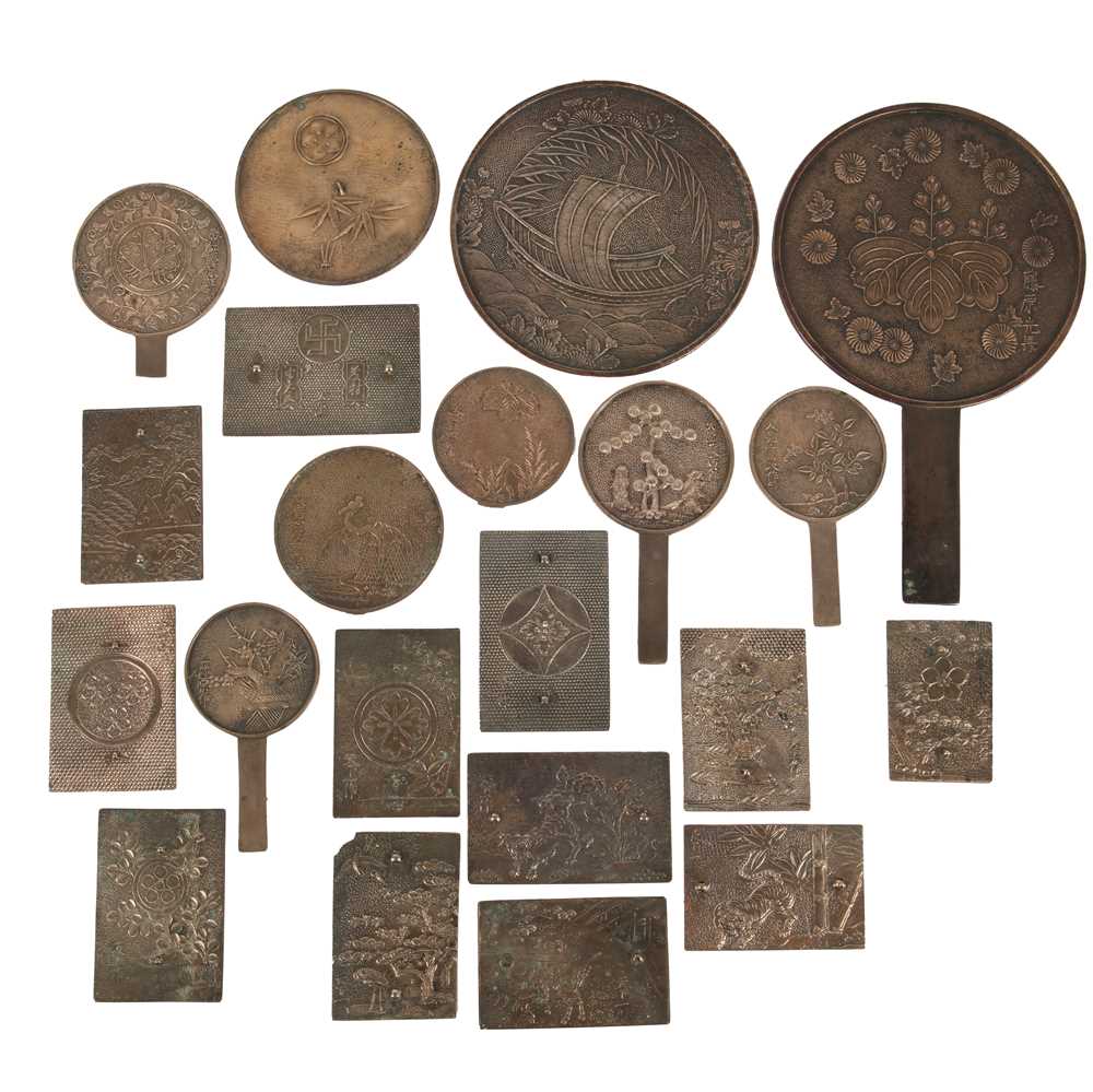 Lot 92 - Twenty one Japanese metal mirrors, Meiji period