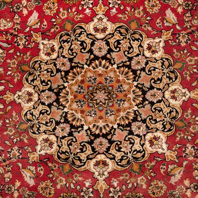 Lot 16 - A fine part silk Tabriz carpet, north-west Persia