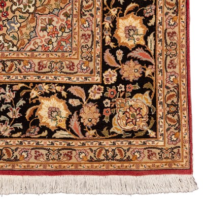 Lot 16 - A fine part silk Tabriz carpet, north-west Persia