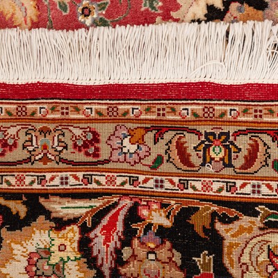 Lot 16 - A fine part silk Tabriz carpet, north-west Persia