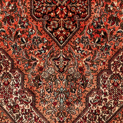 Lot 17 - An extremely fine silk Qum rug, central Persia