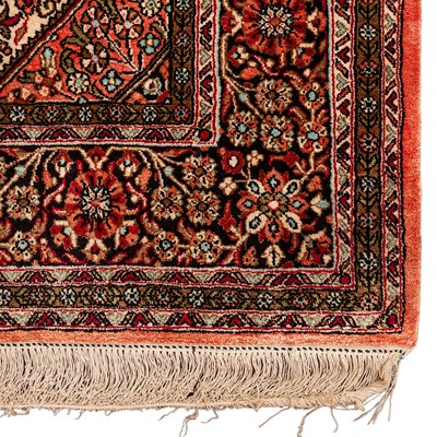 Lot 17 - An extremely fine silk Qum rug, central Persia