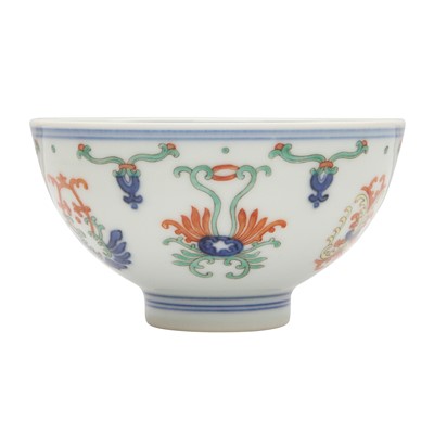 Lot 55 - A Chinese doucai 'honeysuckle' bowl, Qing dynasty, Daoguang mark and of the period